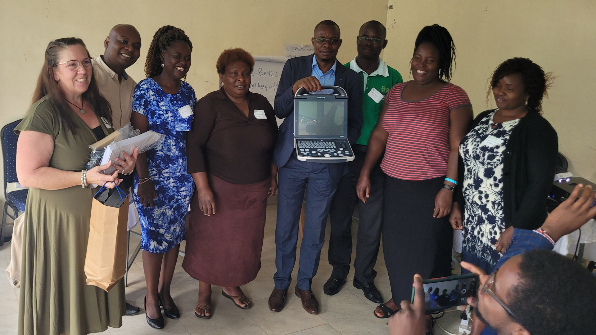 Flutter team with pregnancy center staff after an ultrasound donation